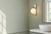 Applique murale toilette