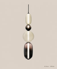 Suspension 4 perles ambre et fumé sur fond studio grège, Ø 16 cm, H 69 cm