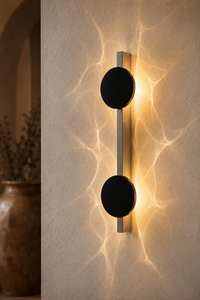 Applique murale à effet de lumière en inox