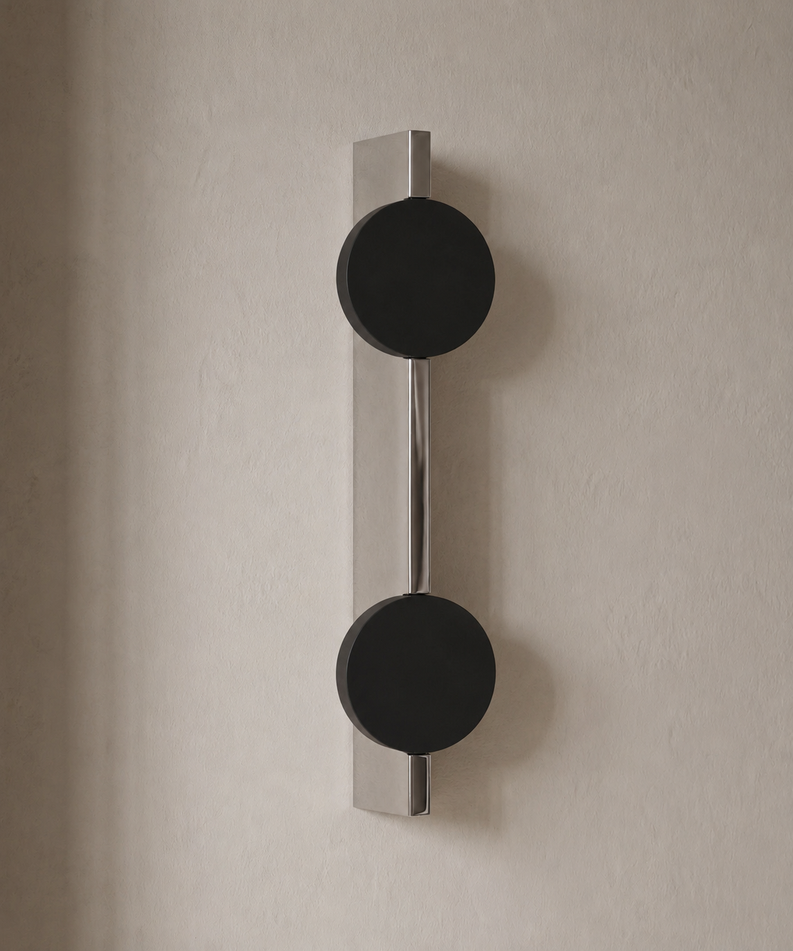 Applique murale à effet de lumière en inox
