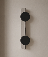 Applique murale à effet de lumière en inox