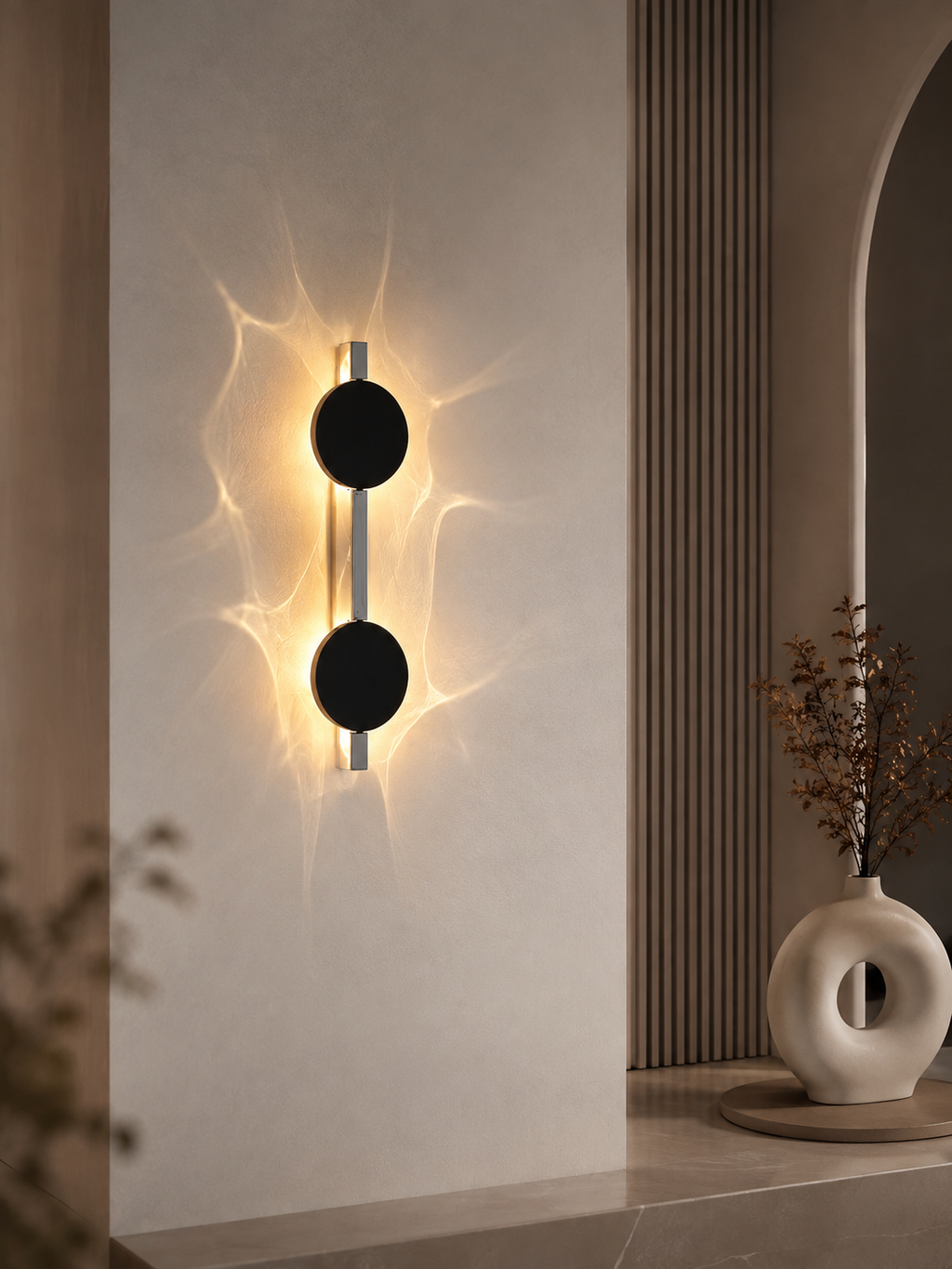 Applique murale à effet de lumière en inox