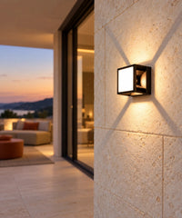 Applique à effet en X sur un mur de terrasse au coucher du soleil