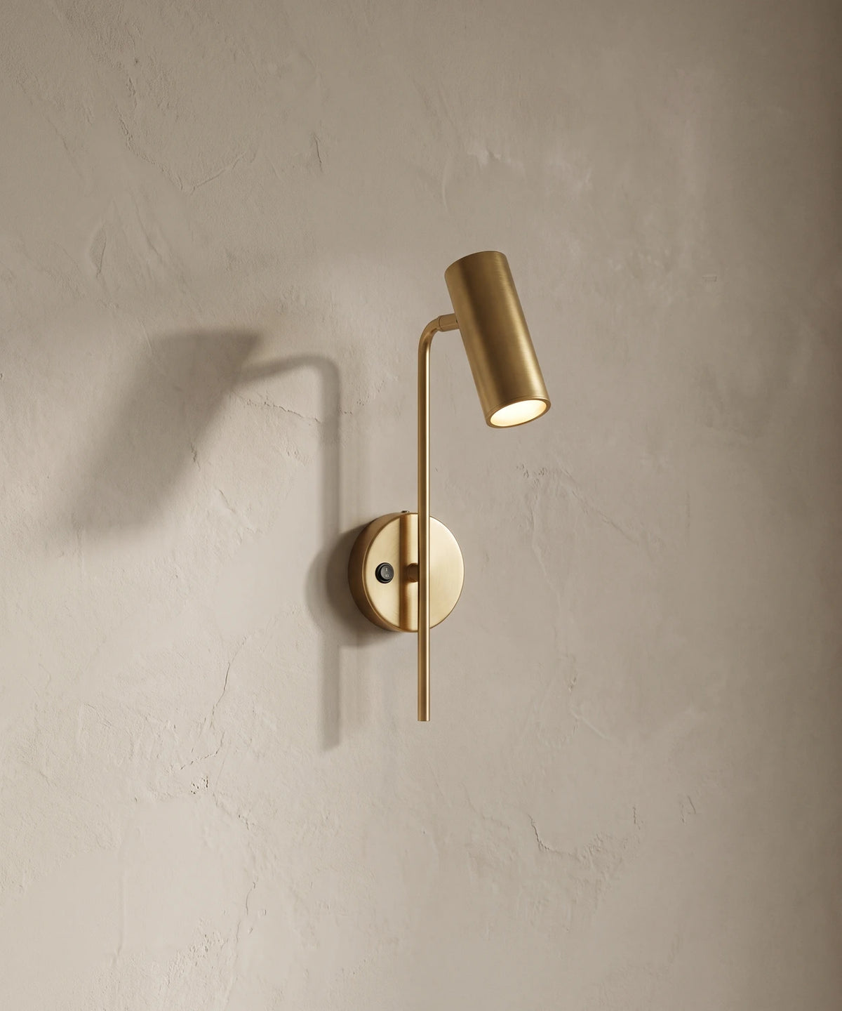 Applique liseuse orientable dorée, spot cylindrique sur rotule