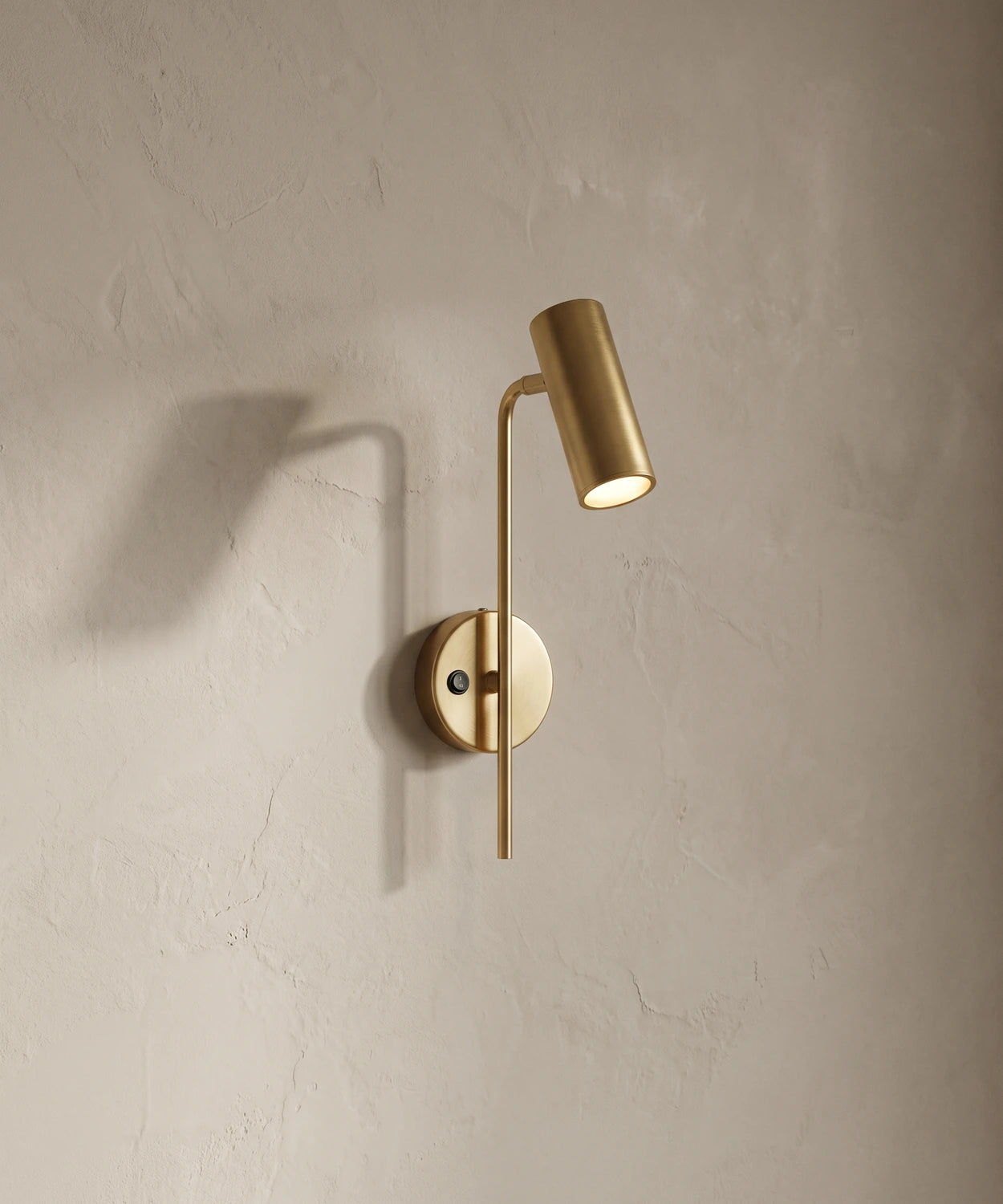 Applique liseuse orientable dorée, spot cylindrique sur rotule