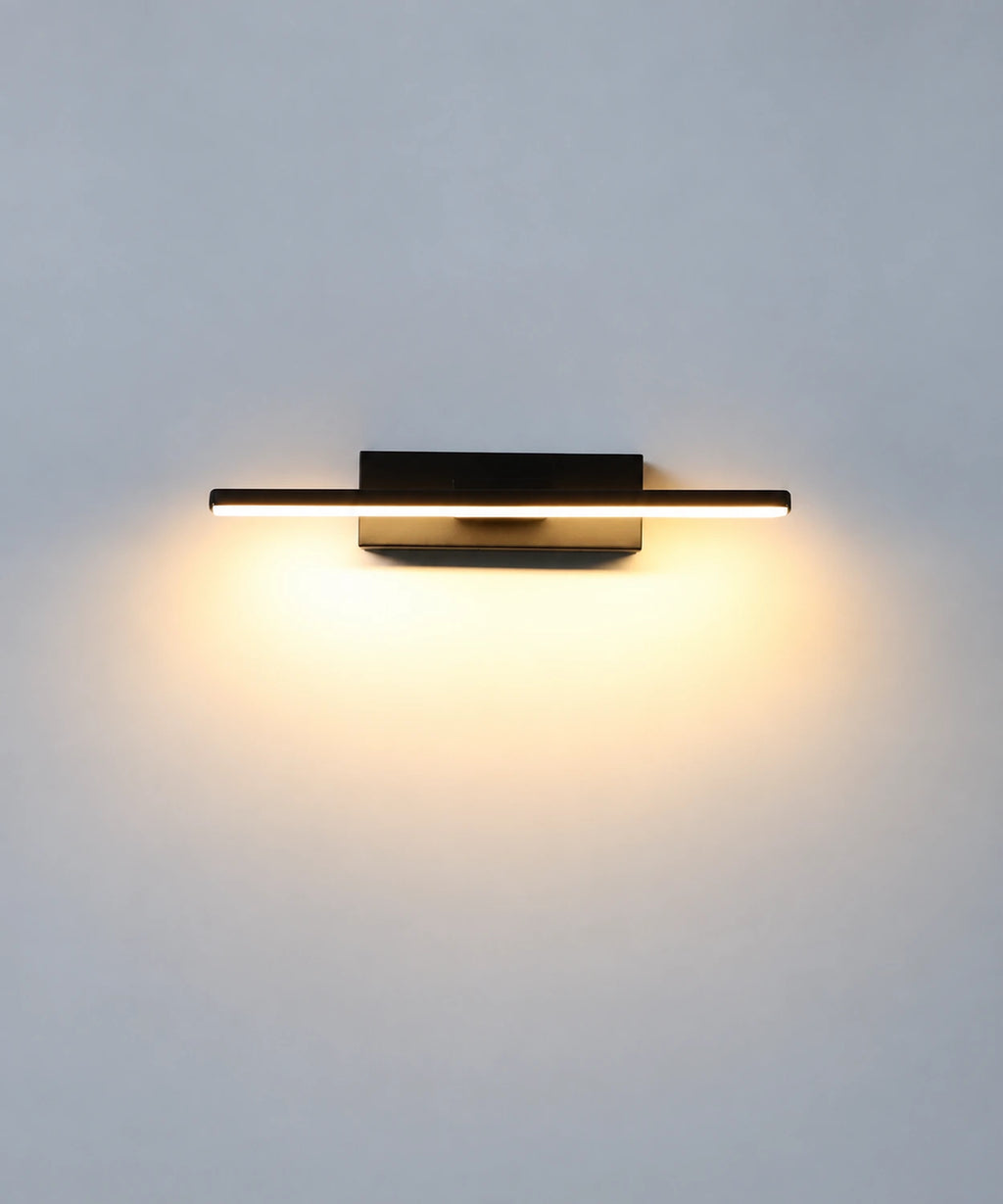Applique murale LED noire en position horizontale, avec une lumière diffusée sur le mur