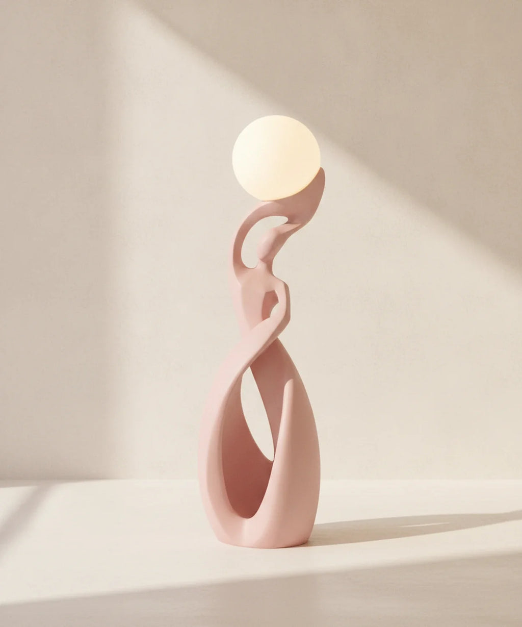 Lampadaire sculpture finition rose poudré mat, sphère lune allumée