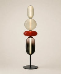 Lampe à poser à quatre boules de verre teinté, e