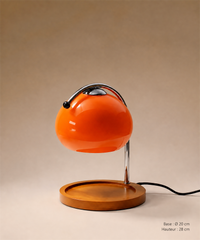 Lampe globe orange vue de face avec son plateau rond et ses dimensions en bas