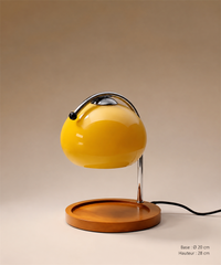 Lampe globe jaune vue de face, plateau rond et câble visibles, avec ses dimensions