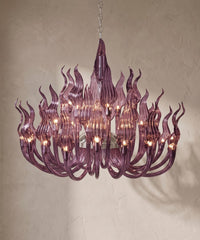 Lustre à bras de cristal violet translucide, flammes sur plusieurs rangs