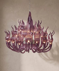 Lustre à bras de cristal violet translucide, flammes sur plusieurs rangs