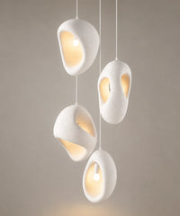 Suspension luminaire galet, les quatre formes de galet blanc suspendues ensemble