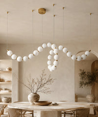 Suspension luminaire plusieurs boules à connecteurs dorés, 125 cm, boucle pendante