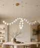 Suspension luminaire plusieurs boules à connecteurs dorés, 125 cm, boucle pendante