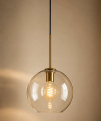 Suspension luminaire verre champagne en boule de 20 cm, monture en laiton antique