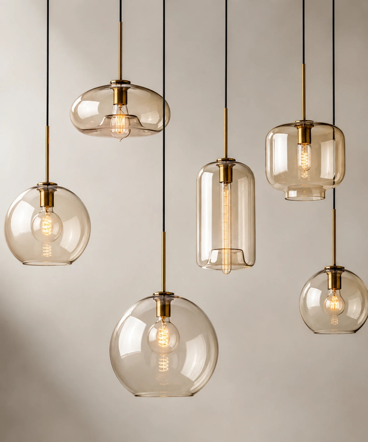 Suspension luminaire verre champagne, les six formes sur monture laiton suspendues ensemble