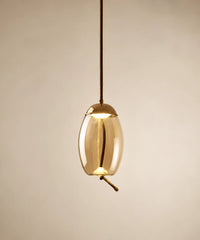 Suspension en verre soufflé cognac, forme ovoïde 18 cm, lumière ambrée