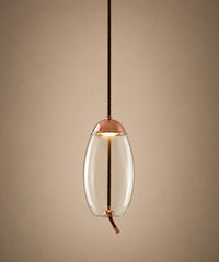 Suspension en verre soufflé transparent, forme ovoïde 18 cm, capuchon cuivré