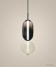 Suspension 2 perles fumé et ambre sur fond studio grège, Ø 15 cm, H 39 cm